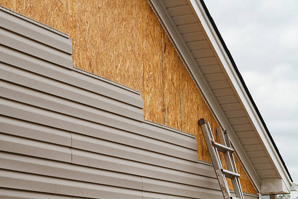 Professional Siding Installation technician working in Pierpont, OH